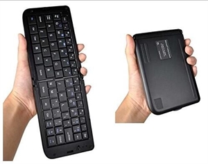 Picture of Universal Stand Ultra-Slim Mini Foldable Wireless portable Handheld Bluetooth Keyboard   for iPhone, iPad, Smart Phones